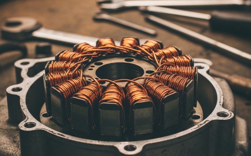 Close-up of ATV stator in open engine