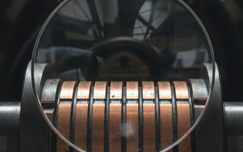 Inspecting a commutator with a magnifier