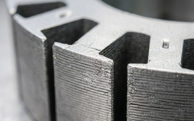 Stator laminations with narrow teeth and punched edges