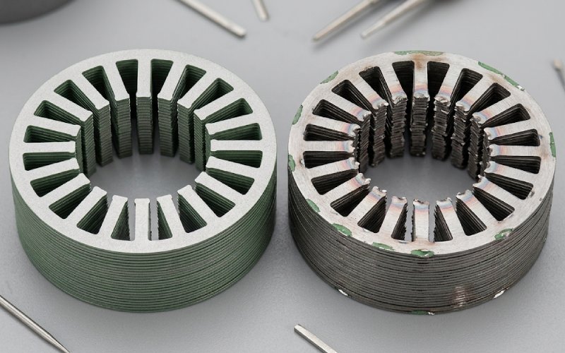 Two motor lamination stack sections side by side