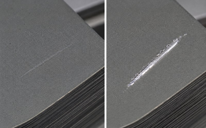 Superficial and coating-penetrating scratches on electrical steel